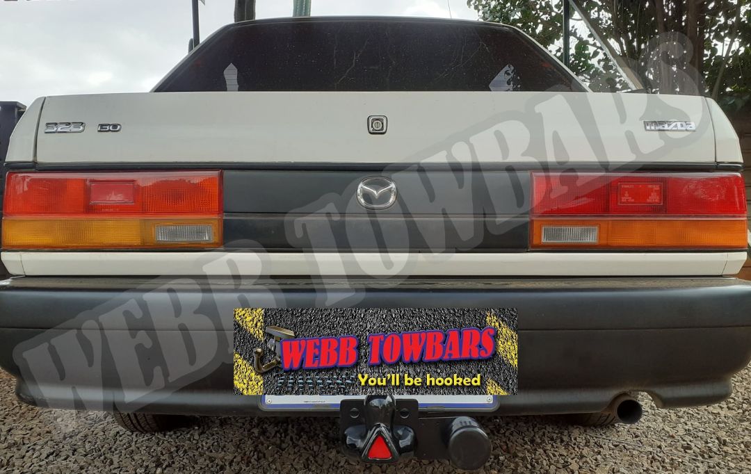 Mazda 323 Sedan with Standard Towbar by Webb Towbars in Gauteng, South Africa