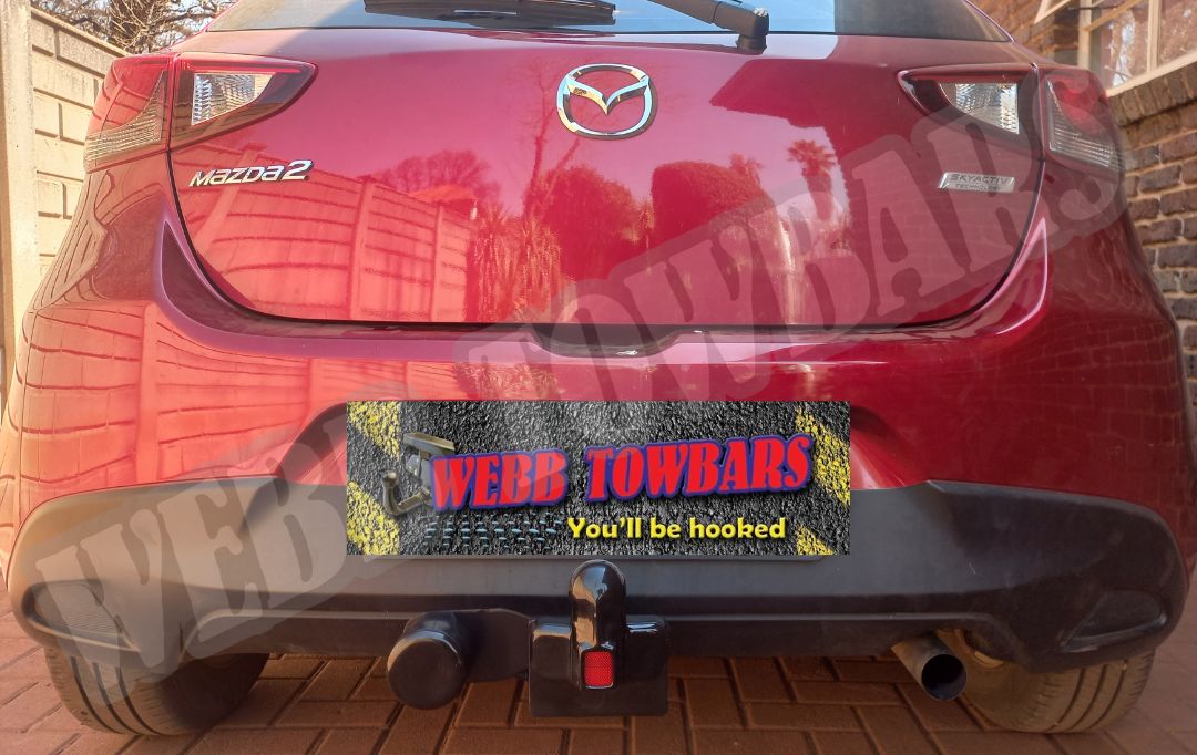 Mazda 2 equipped with a Standard Towbar, expertly manufactured and fitted by Webb Towbars in Gauteng, South Africa.