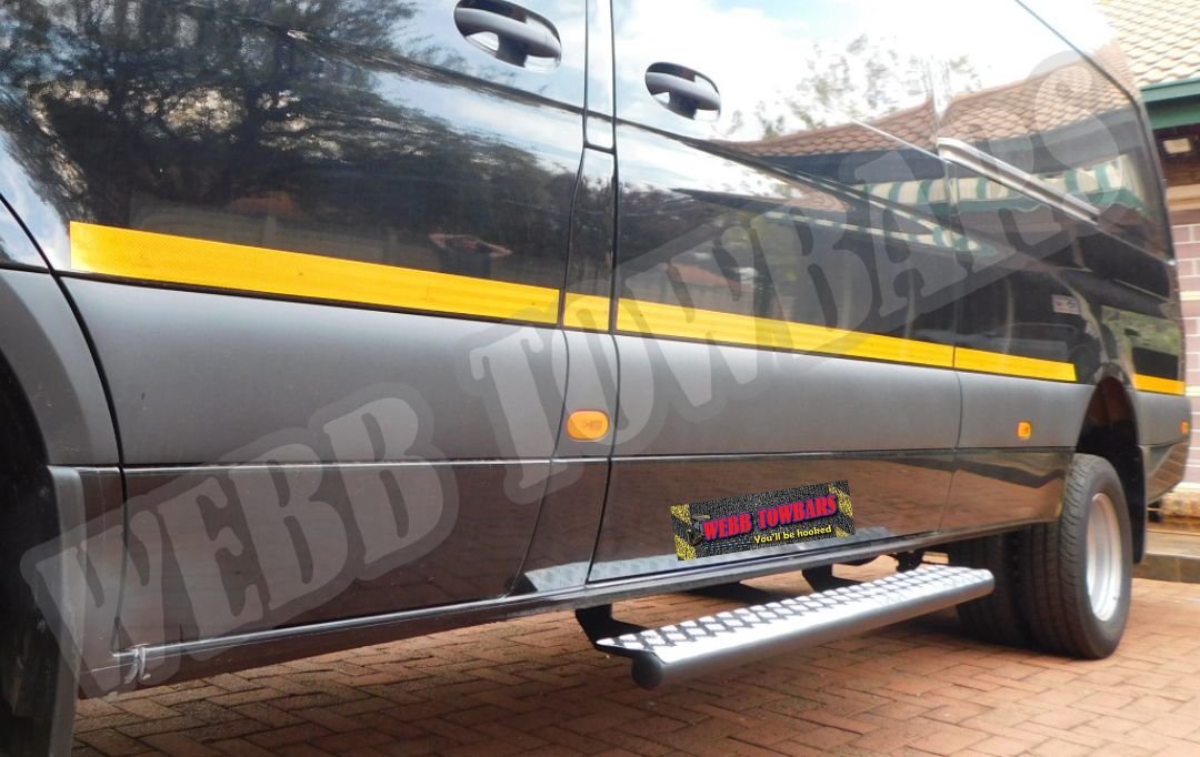 Mercedes Benz Sprinter featuring a sleek Standard Side Step, expertly crafted and installed by Webb Towbars in Gauteng, South Africa for enhanced convenience and style.