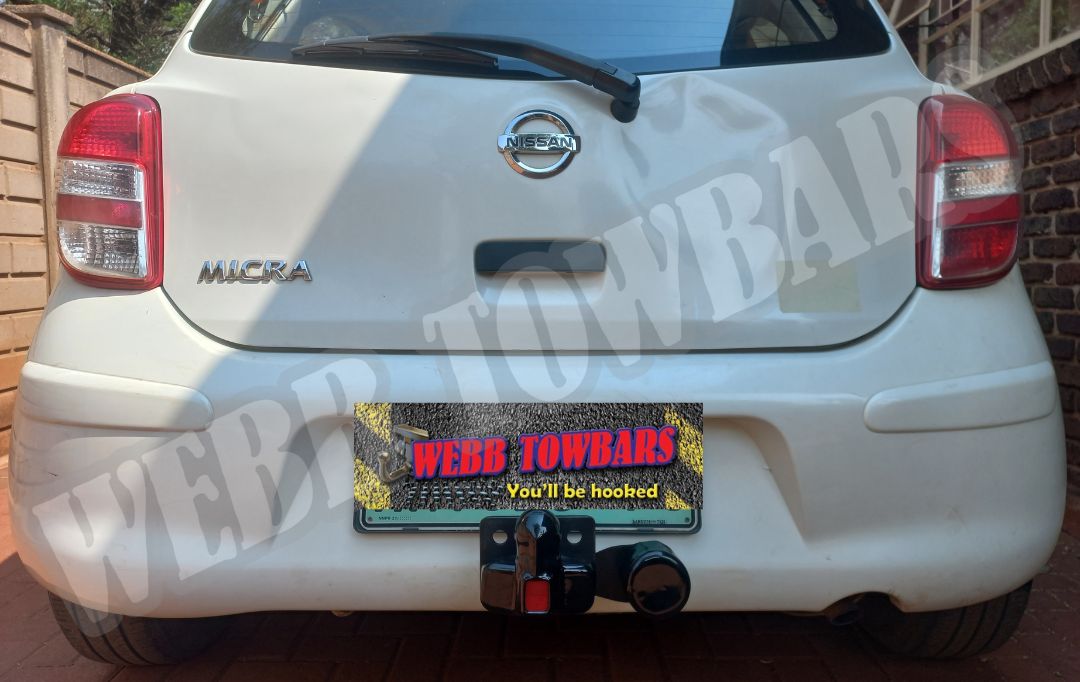 Nissan Micra equipped with a standard towbar, professionally manufactured and installed by Webb Towbars in Gauteng, South Africa, for reliable towing performance.