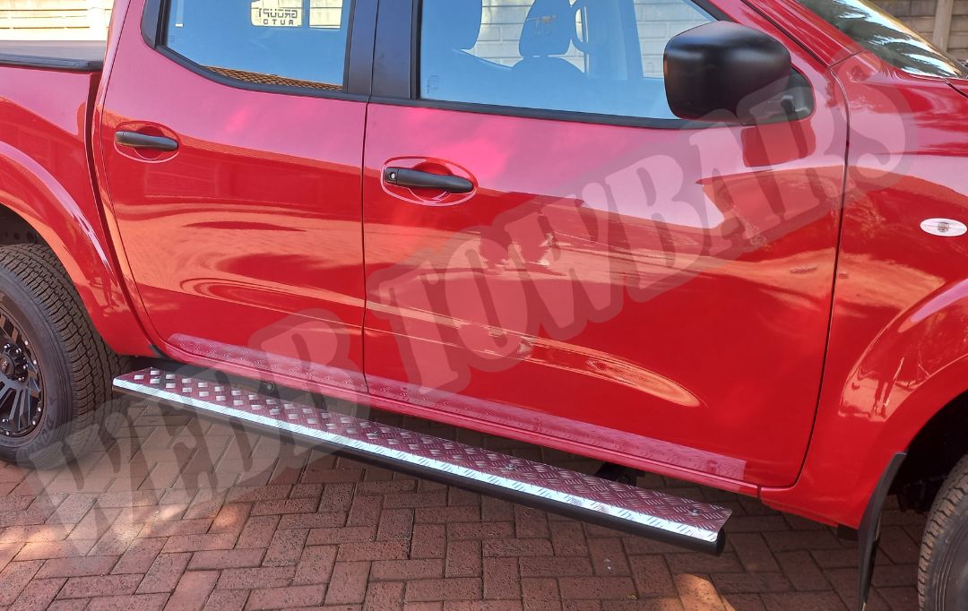 Nissan Navara with durable standard side steps, designed and fitted by Webb Towbars in Gauteng, South Africa for added convenience and accessibility.