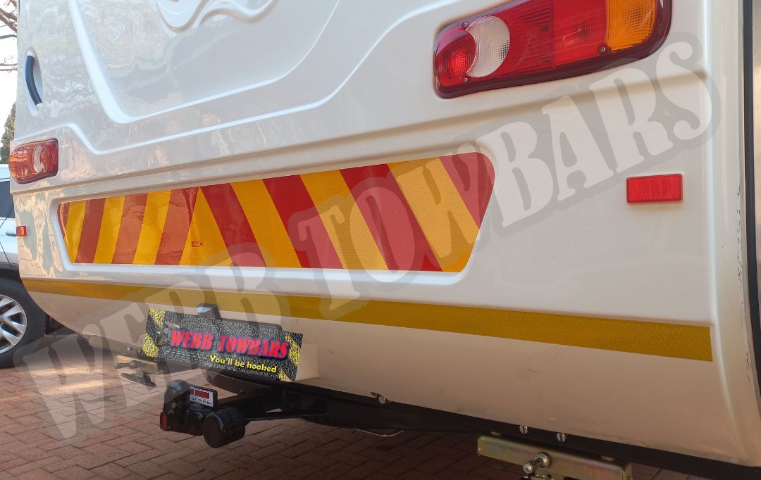 Quantum Country Caravan with a standard towbar, expertly manufactured and fitted by Webb Towbars in Gauteng, South Africa for reliable towing performance.