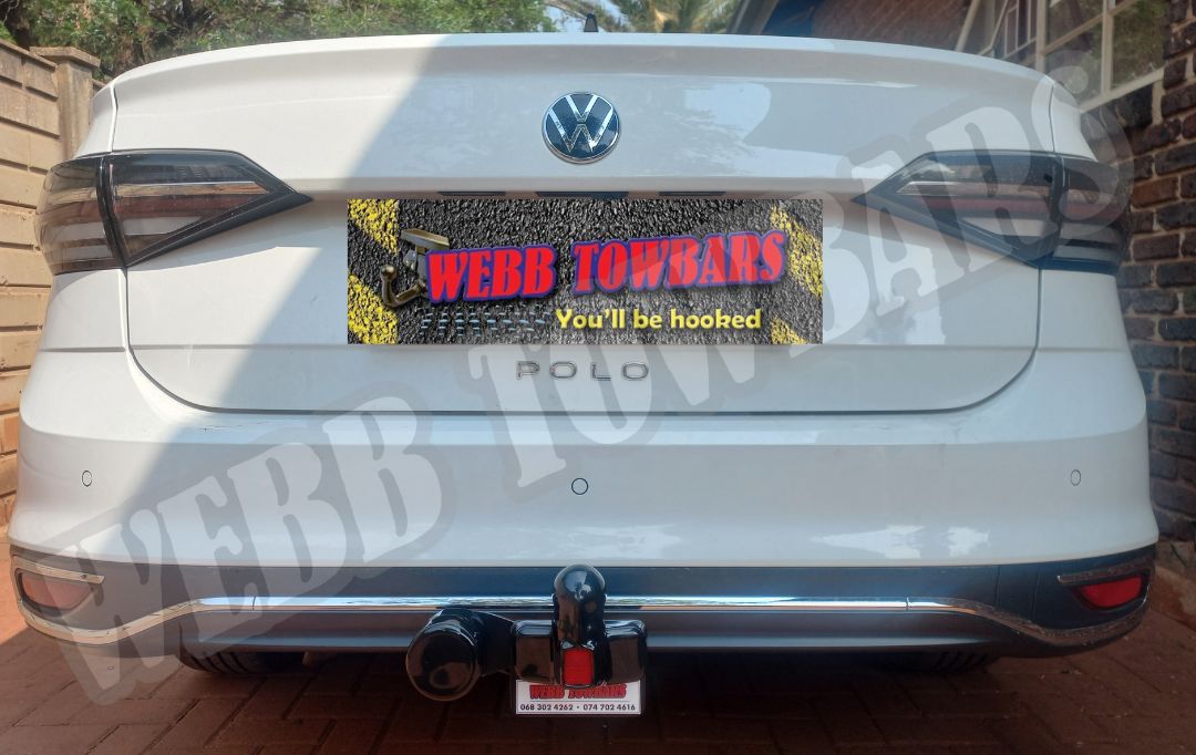 Volkswagen Polo Sedan equipped with a standard towbar, expertly manufactured and fitted by Webb Towbars in Gauteng, South Africa, ensuring reliable towing capability.