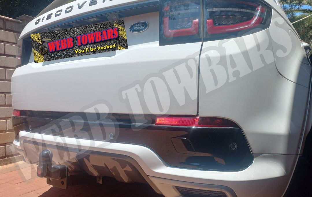 Land Rover Discovery Sport with a detachable towbar, expertly manufactured and fitted by Webb Towbars in Gauteng, South Africa for superior towing flexibility and style.