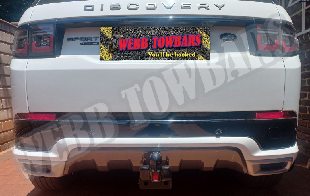 Land Rover Discovery Sport with a detachable towbar, expertly manufactured and fitted by Webb Towbars in Gauteng, South Africa for superior towing flexibility and style.