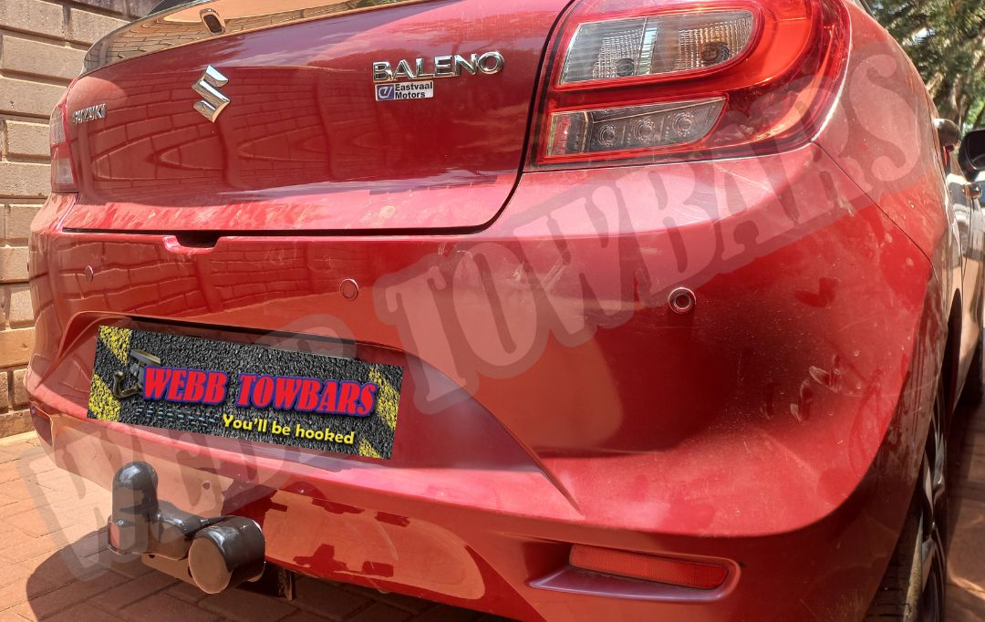 Suzuki Baleno fitted with a standard towbar, expertly manufactured and installed by Webb Towbars in Gauteng, South Africa, offering reliable towing capabilities.