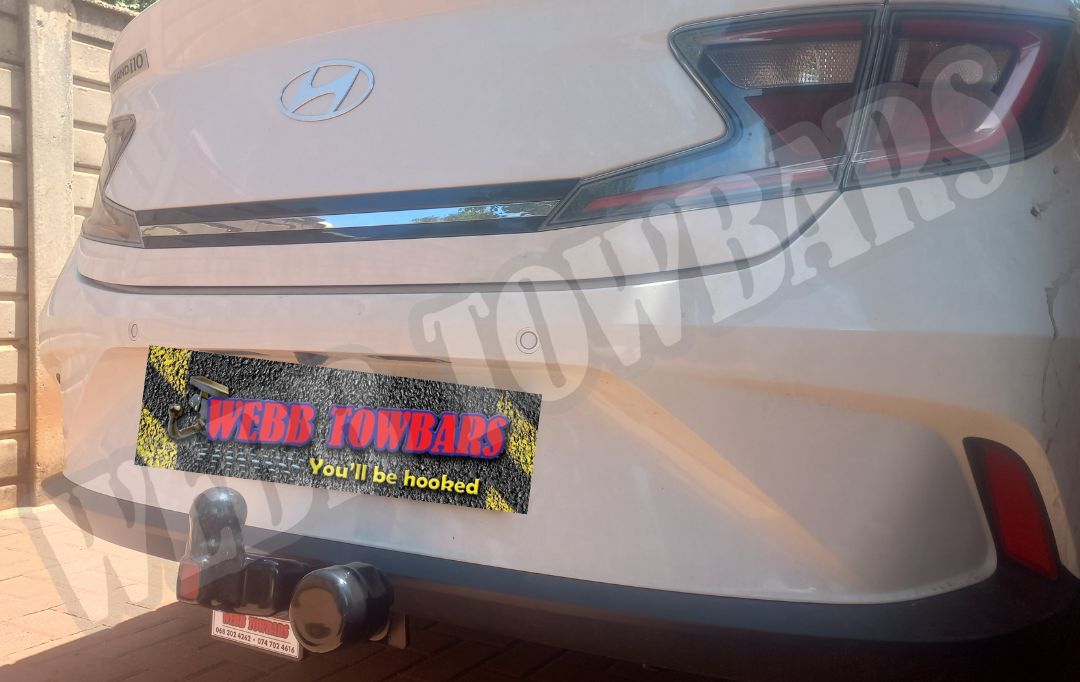 Hyundai i10 Grand Sedan fitted with a standard towbar, professionally manufactured and installed by Webb Towbars in Gauteng, South Africa for dependable towing solutions.