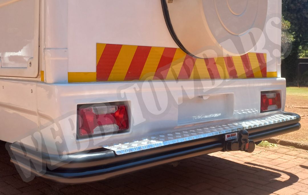 Iveco Daily Travelstar Motorhome wrap-around double tube and step towbar, expertly manufactured and fitted by Webb Towbars in Gauteng, South Africa for enhanced towing functionality.