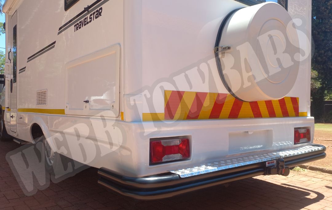 Iveco Daily Travelstar Motorhome wrap-around double tube and step towbar, expertly manufactured and fitted by Webb Towbars in Gauteng, South Africa for enhanced towing functionality.