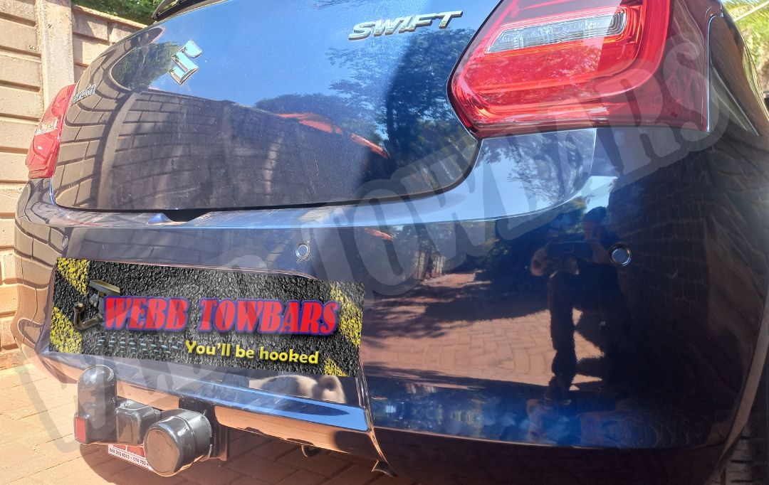 Suzuki Swift equipped with a standard towbar, expertly manufactured and installed by Webb Towbars in Gauteng, South Africa for reliable towing solutions.