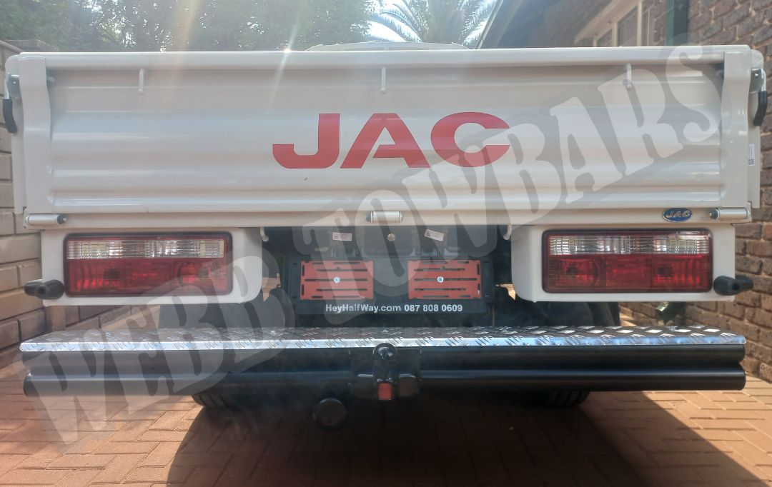 JAC Motors X200 equipped with a double tube and step towbar, manufactured and installed by Webb Towbars in Gauteng, South Africa for reliable towing performance.