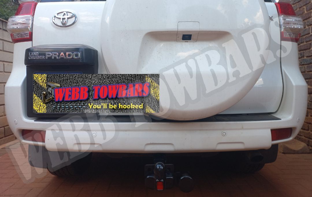 Toyota Land Cruiser Prado equipped with a robust standard towbar, expertly manufactured and installed by Webb Towbars in Gauteng, South Africa, ensuring reliable towing performance.