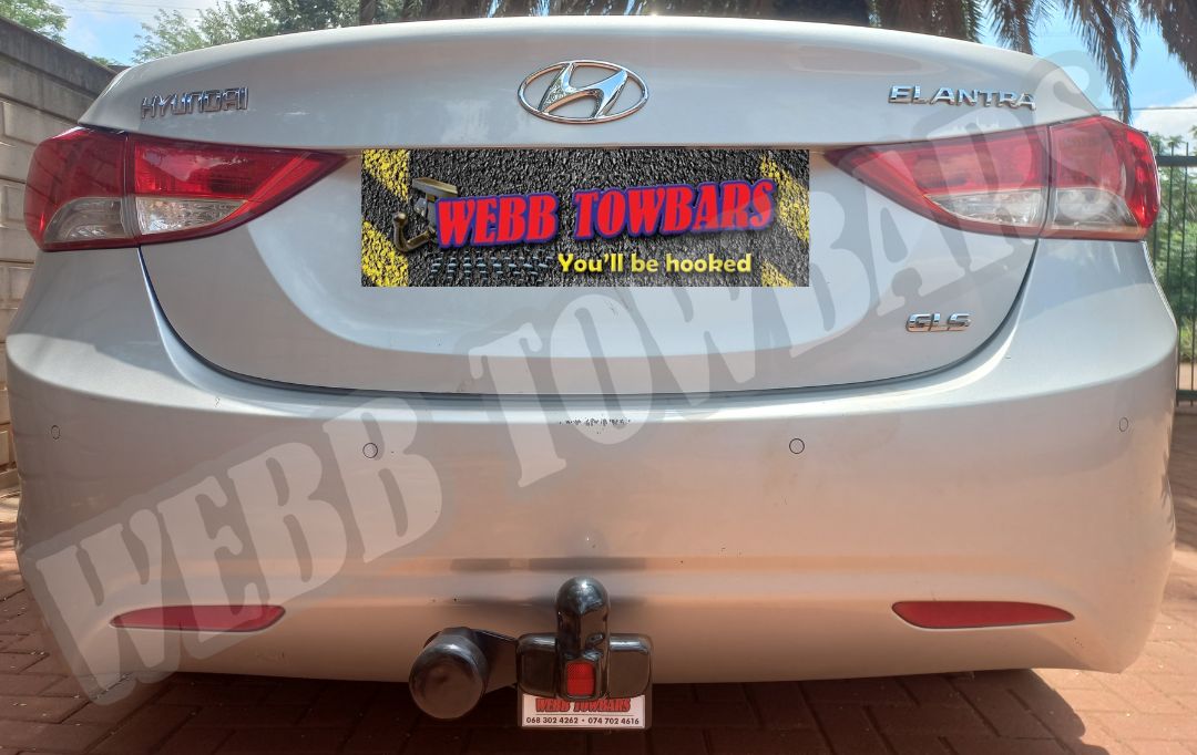 Hyundai Elantra equipped with a durable standard towbar, professionally manufactured and fitted by Webb Towbars in Gauteng, South Africa for reliable towing capabilities.