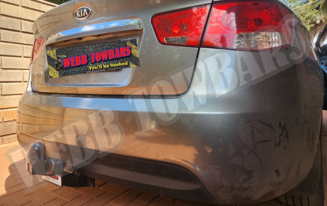 Webb Towbars - Kia Cerato Sedan - Standard Towbar professionally manufactured and expertly fitted by Webb Towbars in Gauteng, South Africa. Premium standard towbar installation for the Kia Cerato Sedan, precision-engineered to provide dependable towing performance for trailers, bicycle racks, luggage trailers and recreational equipment. Expertly manufactured for a secure vehicle-specific fit with a durable corrosion-resistant finish, delivering exceptional strength, safety and long-lasting reliability while preserving the sleek appearance of the Kia Cerato Sedan for everyday driving, business use and weekend getaways.
