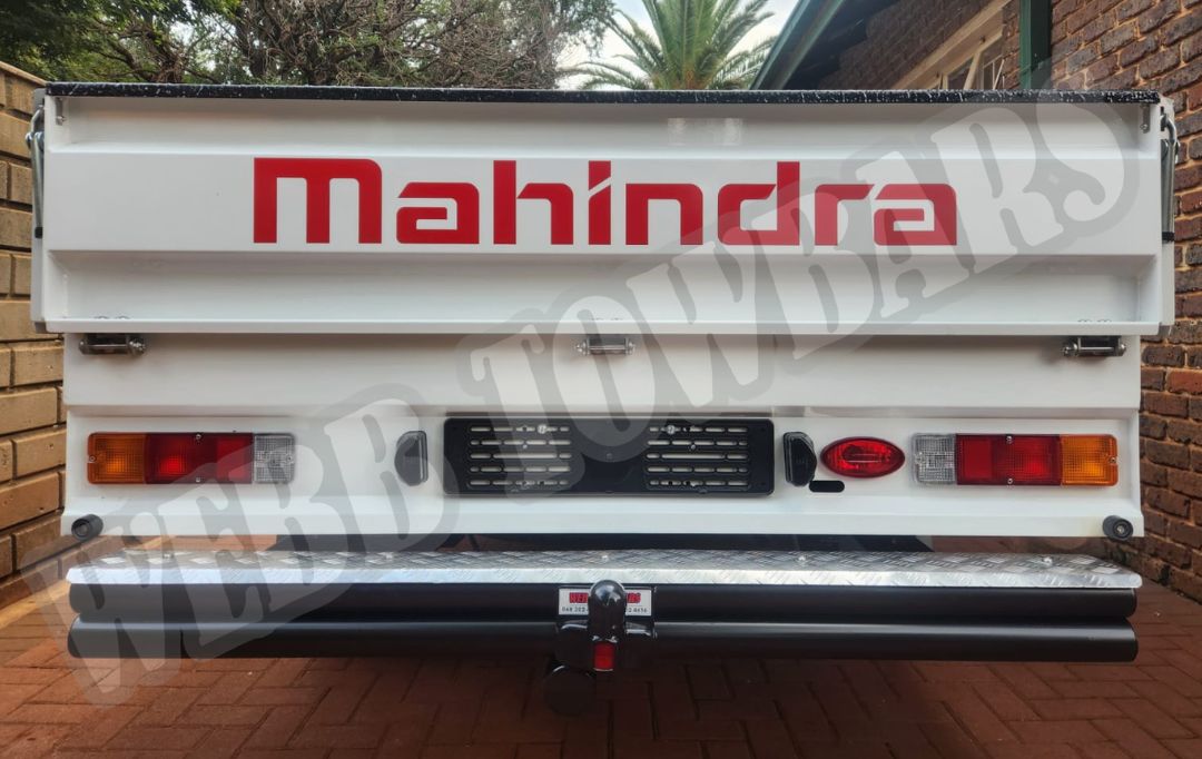 Webb Towbars - Mahindra Scorpio Dropside - Double Tube and Step Towbar professionally manufactured and expertly fitted by Webb Towbars in Gauteng, South Africa. Heavy-duty double tube and rear step towbar engineered specifically for the Mahindra Scorpio Dropside, delivering exceptional towing strength and added practicality for commercial and agricultural applications. Precision-manufactured for a secure vehicle-specific fit with a durable corrosion-resistant finish, this robust towbar provides reliable towing performance for trailers, work equipment and utility loads while the integrated rear step offers convenient access to the load bin, making it the ideal solution for hardworking Mahindra Scorpio Dropside owners across South Africa.