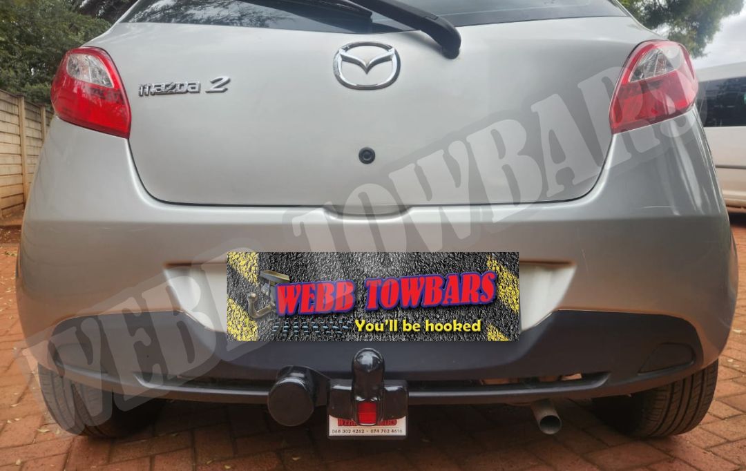Webb Towbars - Mazda 2 - Standard Towbar professionally manufactured and expertly fitted by Webb Towbars in Gauteng, South Africa. Premium standard towbar custom-designed for the Mazda 2, precision-engineered to provide dependable towing performance for luggage trailers, bicycle racks, small utility trailers and recreational equipment. Expertly manufactured for a secure vehicle-specific fit with a durable corrosion-resistant finish, delivering outstanding strength, safety and long-lasting reliability while complementing the sleek styling of the Mazda 2, making it the ideal towing solution for everyday driving, weekend adventures and practical transport needs.