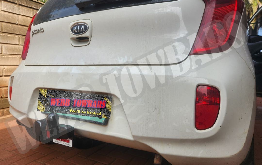 Webb Towbars - Kia Picanto - Standard Towbar professionally installed by Webb Towbars in Gauteng, South Africa. Vehicle-specific standard towbar designed for the Kia Picanto, adding practical towing versatility while complementing the compact hatchback’s modern styling and economical everyday design. Ideal for suitable light trailers, luggage trailers, bicycle racks and recreational equipment, this robust towbar provides a secure precision fit, durable corrosion-resistant finish and dependable long-term performance. Professionally installed by Webb Towbars, this Kia Picanto towbar solution enhances the vehicle’s practicality for everyday driving, family outings, weekend getaways and light recreational towing throughout Gauteng and South Africa.