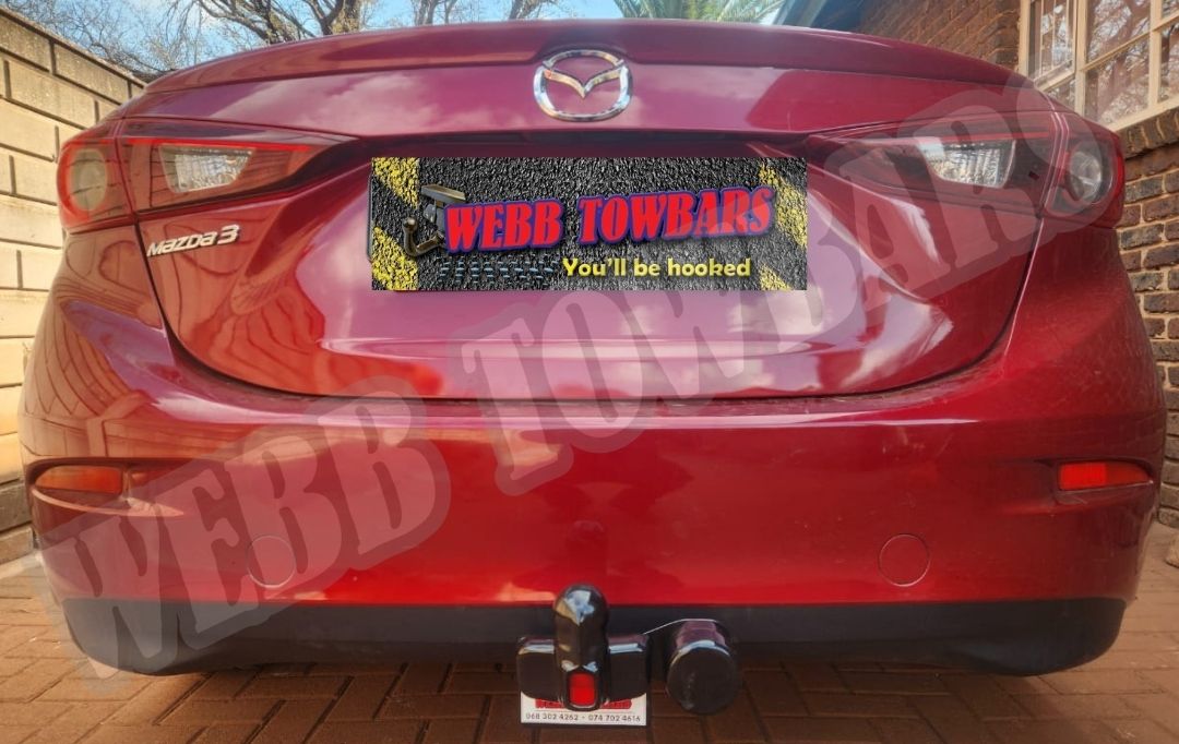 Webb Towbars - Mazda 3 Sedan - Standard Towbar professionally installed by Webb Towbars in Gauteng, South Africa. Vehicle-specific standard towbar designed for the Mazda 3 Sedan, adding practical towing versatility while maintaining a neat fit that complements the sedan’s sleek styling, refined appearance and everyday functionality. Ideal for suitable light trailers, luggage trailers, bicycle racks and recreational equipment, this robust towbar provides a secure precision fit, durable corrosion-resistant finish and dependable long-term performance. Professionally installed by Webb Towbars, this Mazda 3 Sedan standard towbar enhances the vehicle’s versatility for daily driving, family trips, weekend getaways and light recreational towing throughout Gauteng and South Africa.