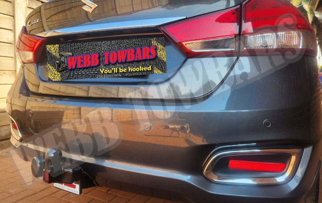 Webb Towbars - Suzuki Ciaz - Standard Towbar professionally installed by Webb Towbars in Gauteng, South Africa. Vehicle-specific standard towbar designed for the Suzuki Ciaz, adding practical towing versatility while maintaining a neat fit that complements the sedan’s sleek styling, spacious interior and economical everyday design. Ideal for suitable light trailers, luggage trailers, bicycle racks and recreational equipment, this robust towbar provides a secure precision fit, durable corrosion-resistant finish and dependable long-term performance. Professionally installed by Webb Towbars, this Suzuki Ciaz standard towbar enhances the vehicle’s functionality for daily driving, family travel, business use, weekend getaways and light recreational towing throughout Gauteng and South Africa.