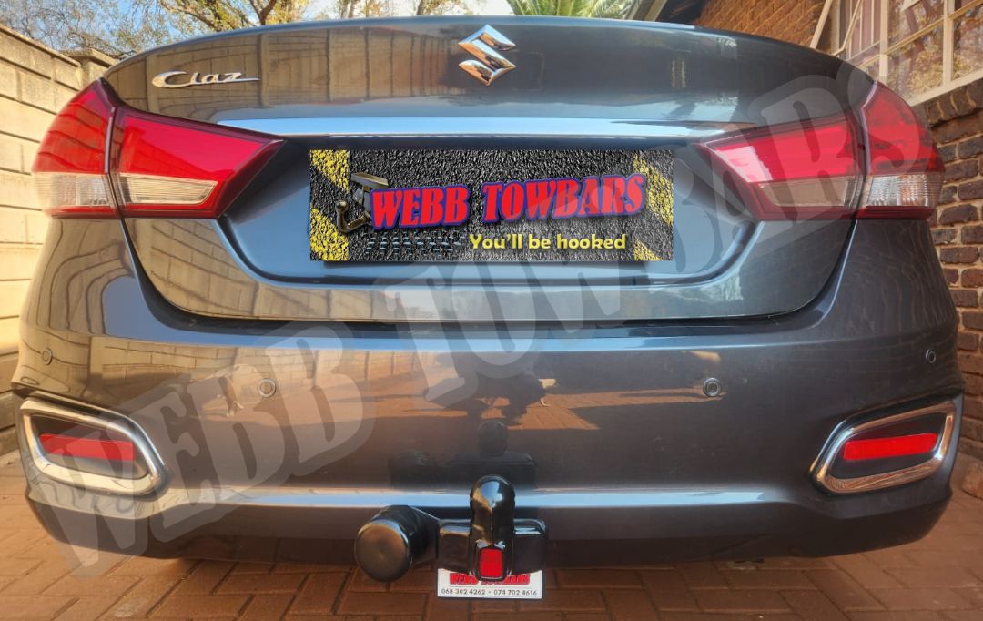 Webb Towbars - Suzuki Ciaz - Standard Towbar professionally installed by Webb Towbars in Gauteng, South Africa. Vehicle-specific standard towbar designed for the Suzuki Ciaz, adding practical towing versatility while maintaining a neat fit that complements the sedan’s sleek styling, spacious interior and economical everyday design. Ideal for suitable light trailers, luggage trailers, bicycle racks and recreational equipment, this robust towbar provides a secure precision fit, durable corrosion-resistant finish and dependable long-term performance. Professionally installed by Webb Towbars, this Suzuki Ciaz standard towbar enhances the vehicle’s functionality for daily driving, family travel, business use, weekend getaways and light recreational towing throughout Gauteng and South Africa.