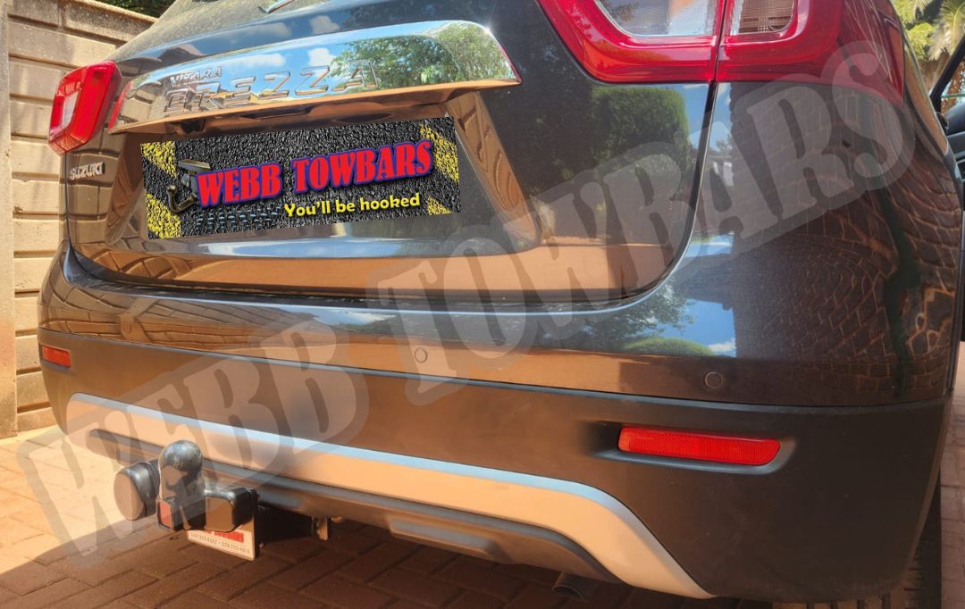 Webb Towbars - Suzuki Vitara Brezza - Standard Towbar professionally installed by Webb Towbars in Gauteng, South Africa. Vehicle-specific standard towbar designed for the Suzuki Vitara Brezza, adding practical towing versatility while maintaining a neat fit that complements the compact SUV’s distinctive styling, elevated stance and everyday functionality. Ideal for suitable light trailers, luggage trailers, bicycle racks, camping equipment and recreational towing applications within the vehicle’s approved towing specifications, this robust towbar provides a secure precision fit, durable corrosion-resistant finish and dependable long-term performance. Professionally installed by Webb Towbars, this Suzuki Vitara Brezza standard towbar enhances the SUV’s practicality for daily driving, family outings, weekend getaways and outdoor adventures throughout Gauteng and South Africa.