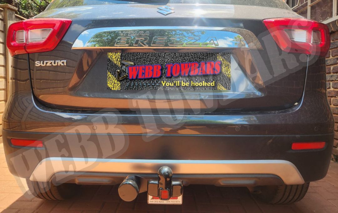 Webb Towbars - Suzuki Vitara Brezza - Standard Towbar professionally installed by Webb Towbars in Gauteng, South Africa. Vehicle-specific standard towbar designed for the Suzuki Vitara Brezza, adding practical towing versatility while maintaining a neat fit that complements the compact SUV’s distinctive styling, elevated stance and everyday functionality. Ideal for suitable light trailers, luggage trailers, bicycle racks, camping equipment and recreational towing applications within the vehicle’s approved towing specifications, this robust towbar provides a secure precision fit, durable corrosion-resistant finish and dependable long-term performance. Professionally installed by Webb Towbars, this Suzuki Vitara Brezza standard towbar enhances the SUV’s practicality for daily driving, family outings, weekend getaways and outdoor adventures throughout Gauteng and South Africa.
