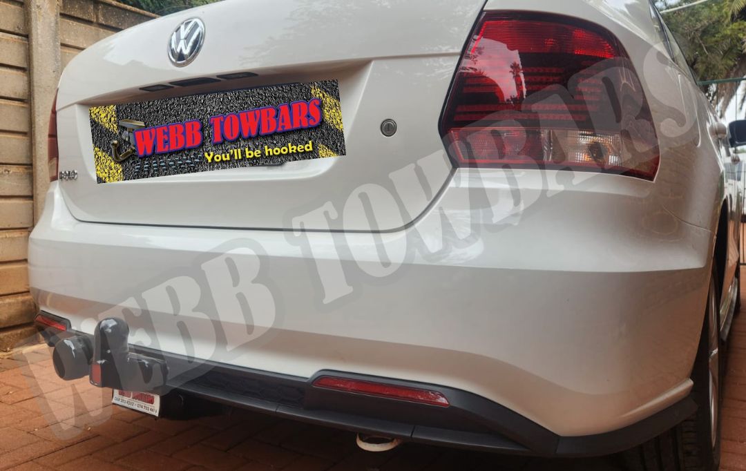 Webb Towbars - Volkswagen Polo Sedan - Standard Towbar professionally installed by Webb Towbars in Gauteng, South Africa. Vehicle-specific standard towbar fitted to the Volkswagen Polo Sedan, adding practical towing versatility while maintaining a neat finish that complements the sedan’s modern styling, spacious boot and reliable everyday design. Suitable for approved applications including light trailers, luggage trailers, bicycle racks and recreational equipment within the Volkswagen Polo Sedan’s specified towing limits, this robust towbar provides a secure precision fit, durable corrosion-resistant finish and dependable long-term performance. Professionally installed by Webb Towbars, this Volkswagen Polo Sedan standard towbar adds valuable functionality for daily driving, business use, family travel, weekend getaways and light recreational towing throughout Gauteng and South Africa.