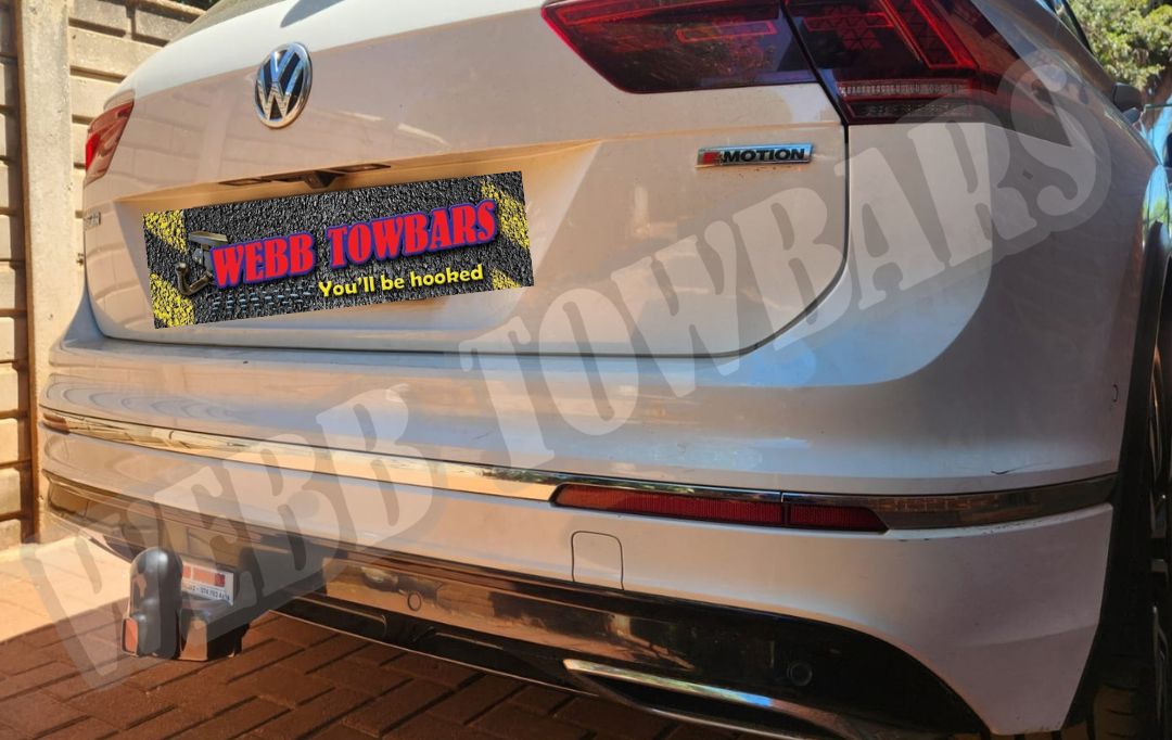Webb Towbars - Volkswagen Tiguan - Detachable Towbar professionally installed by Webb Towbars in Gauteng, South Africa. Vehicle-specific detachable towbar fitted to the Volkswagen Tiguan, providing practical towing versatility with the convenience of a removable tow hitch to help maintain the SUV’s clean, premium rear appearance when the towbar is not required. Suitable for approved towing applications including trailers, caravans, luggage trailers, bicycle racks and recreational equipment within the Volkswagen Tiguan’s specified towing capacity, this robust detachable towbar provides a secure precision fit, durable corrosion-resistant finish and dependable long-term performance. Professionally installed by Webb Towbars, this Volkswagen Tiguan detachable towbar combines discreet styling, everyday convenience and reliable towing functionality for family travel, holidays, cycling, camping and weekend adventures throughout Gauteng and South Africa.