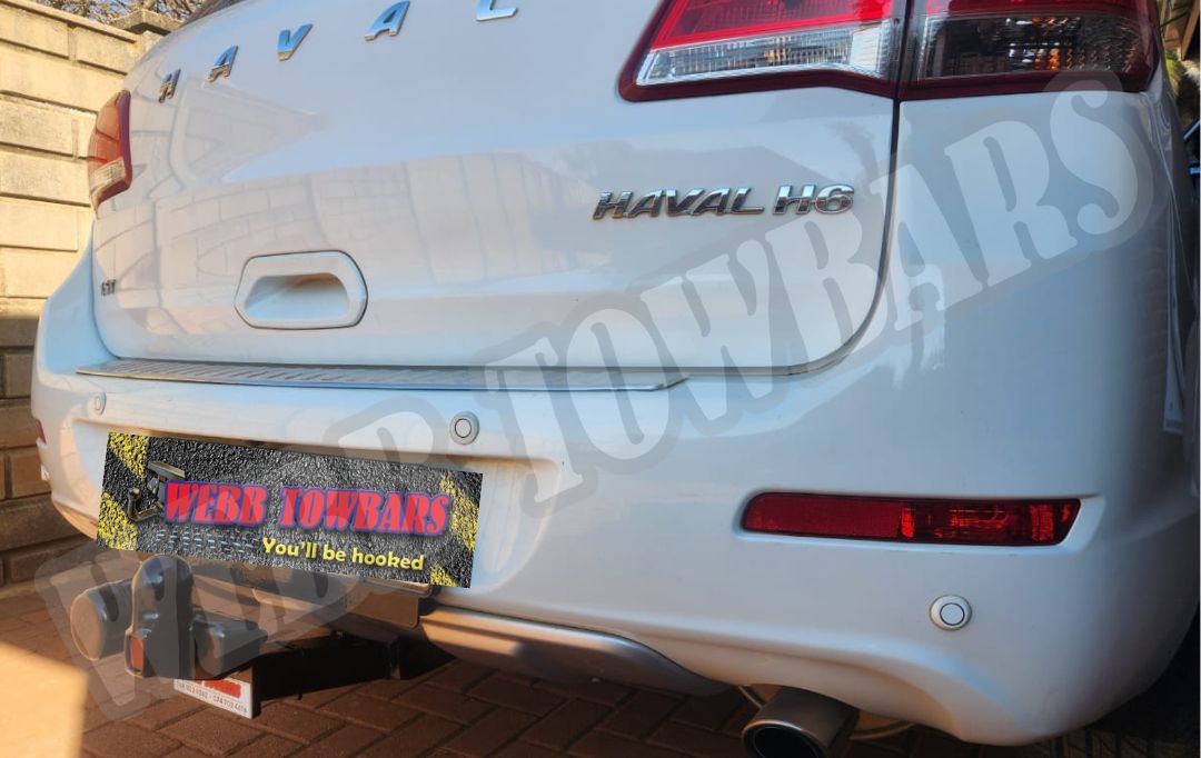 Webb Towbars - Haval H6 2019 - Standard Towbar professionally installed by Webb Towbars in Gauteng, South Africa. Vehicle-specific standard towbar fitted to the 2019 Haval H6 SUV, enhancing its everyday practicality, towing versatility and family-friendly functionality while complementing the vehicle's modern exterior styling, spacious design and distinctive rear profile. Featuring robust construction, a secure vehicle-specific fitment and a neat, professional finish, this standard towbar provides dependable functionality for suitable towing and carrying applications, including light trailers, luggage trailers, compatible bicycle carriers and recreational equipment within the 2019 Haval H6's manufacturer-approved towing limits. Ideal for family holidays, cycling outings, outdoor adventures, weekend getaways and everyday convenience, this professionally installed Webb Towbars standard towbar adds valuable versatility to the Haval H6. Expertly fitted by Webb Towbars in Gauteng, South Africa, with attention to quality workmanship, durability, secure installation and reliable long-term performance.